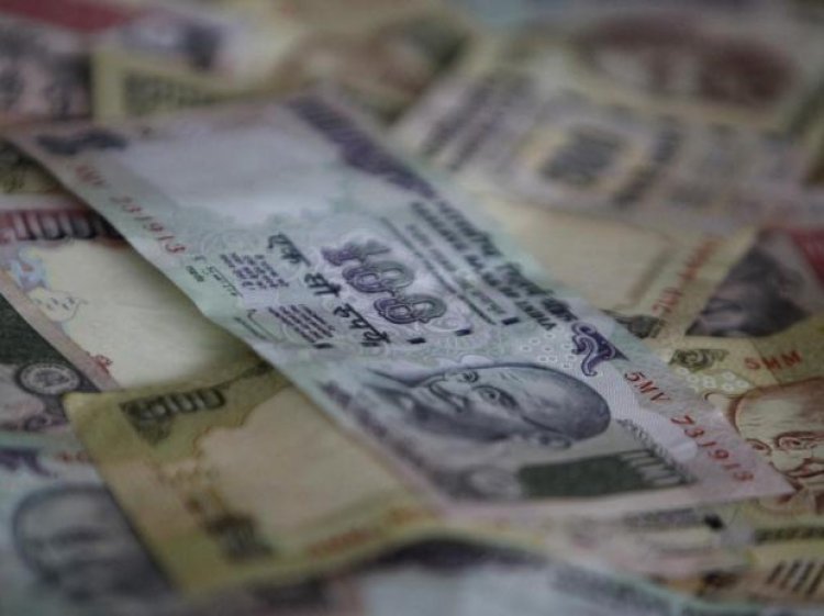 Rupee slumps by 23 paise on strong dollar, high crude prices