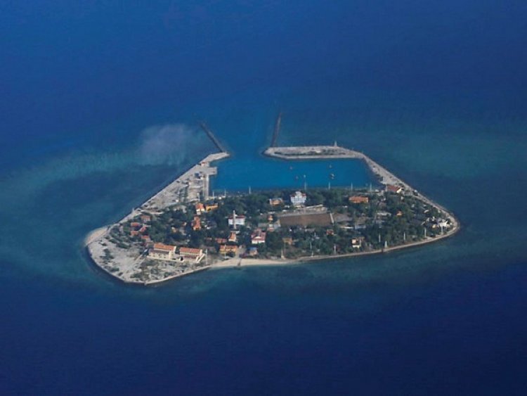 China reclaiming land to extend Spratly Islands reef in South China Sea, show satellite images