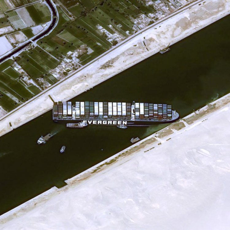 Egypt races to free giant vessel blocking Suez Canal