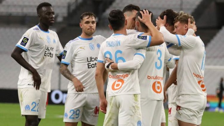 Marseille beats Dijon to stay on track for Europa League