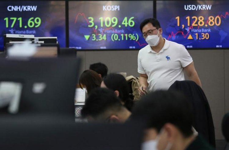 Asian stocks up after Wall St. record amid vaccine optimism