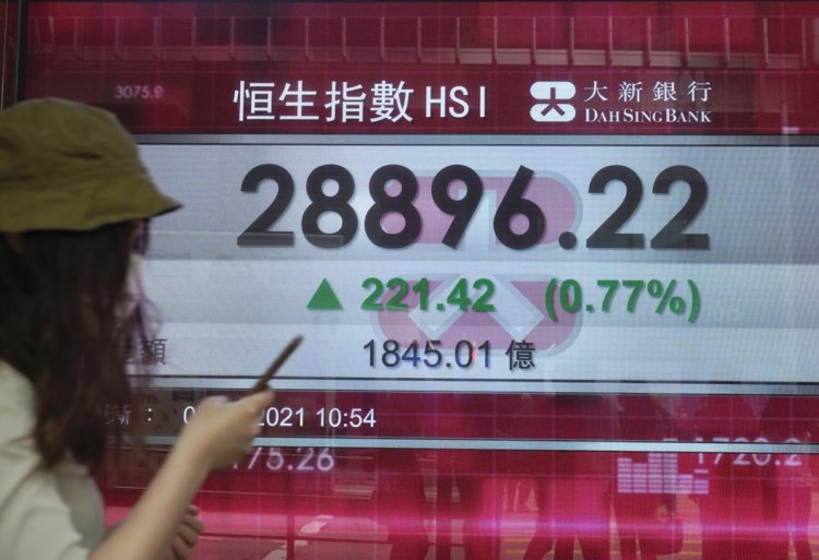 Asian shares mostly lower on strong China price data