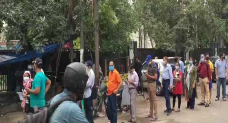 Queues outside COVID-19 vaccination centres in UP's Noida, Ghaziabad