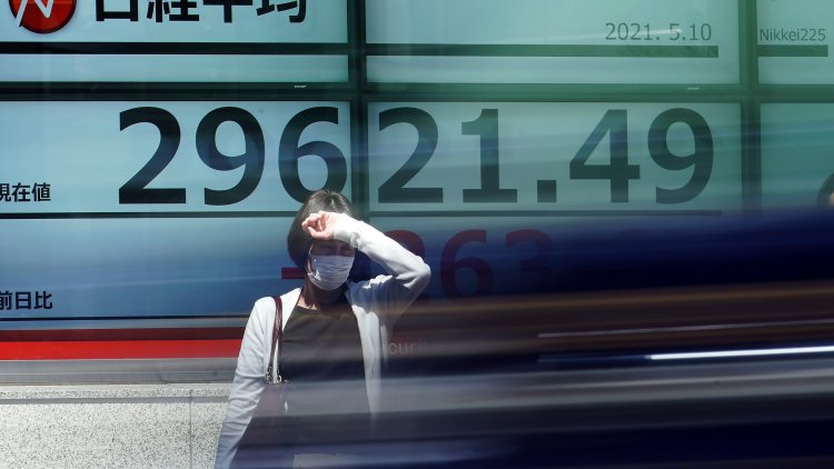 Asian shares slide after tech sell-off on Wall Street