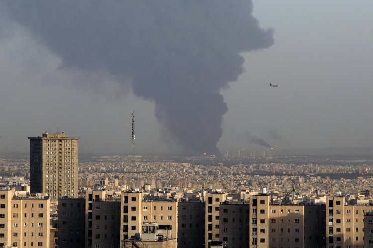 Oil refinery fire near Iran's capital burns into second day