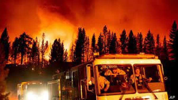 Heat, wind spur California fire; evacuation hits Nevada area