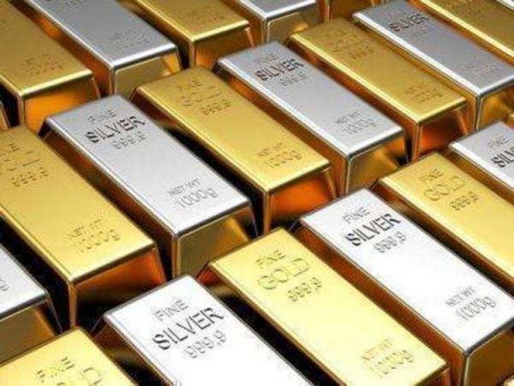 Gold declines Rs 365; silver gains marginally