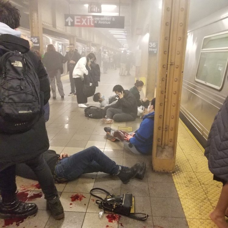 Gunman sets off smoke bomb, shoots 11 in rush-hour New York subway car