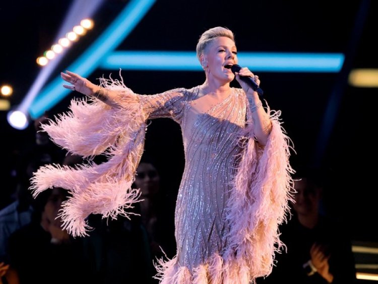Pink honours late 'Grease' star with heartfelt performance at AMAs