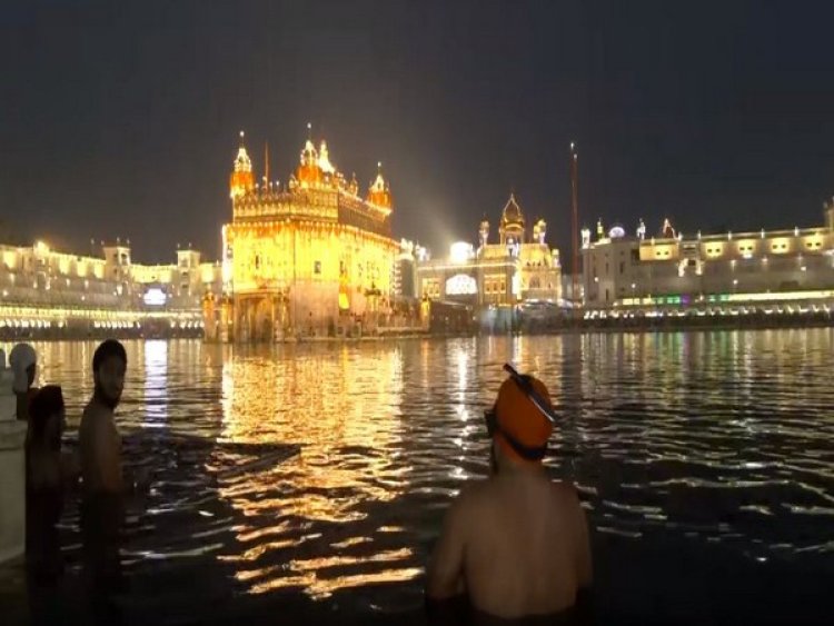 Amritsar: Devotees take holy dip in Amrit Kund at Golden Temple on birth anniversary of Guru Ram Das