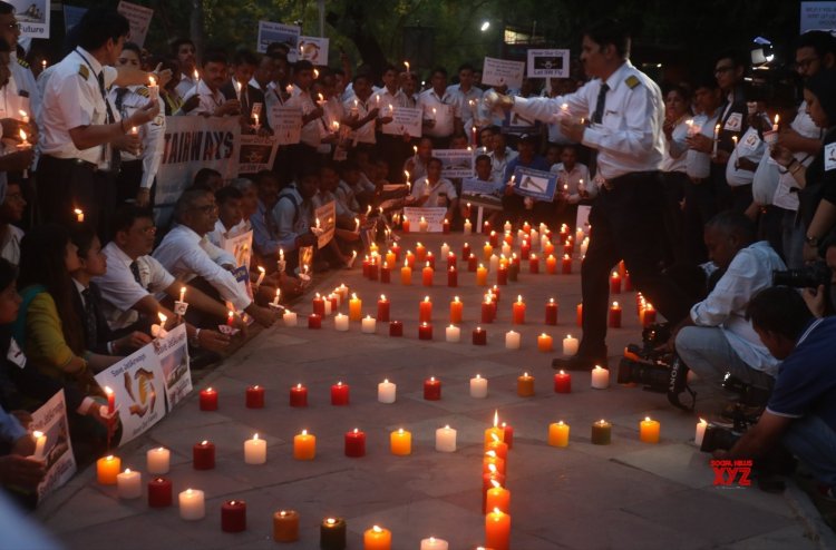 Jet Airways employees take out candle march