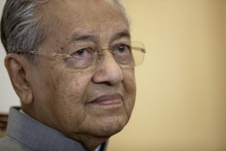 Malaysian PM says no timetable for handing over power