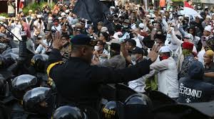 Protesters clash with Indonesian police after election loss