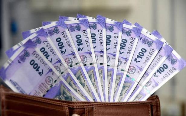 Rupee rises 11 paise to 69.80 vs USD in early trade