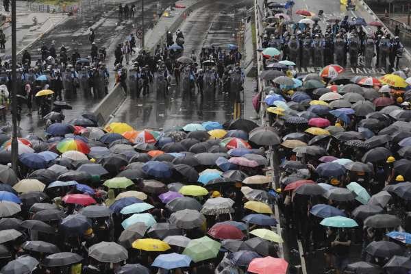 Protests escalate as Hong Kong marks handover to China