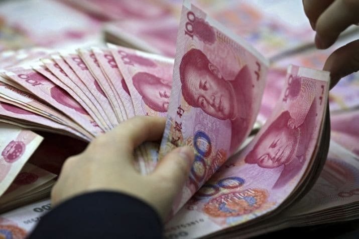 China further weakens yuan rate as currency row simmers