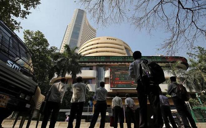 Sensex drops over 200 pts; RIL soars 8 pc