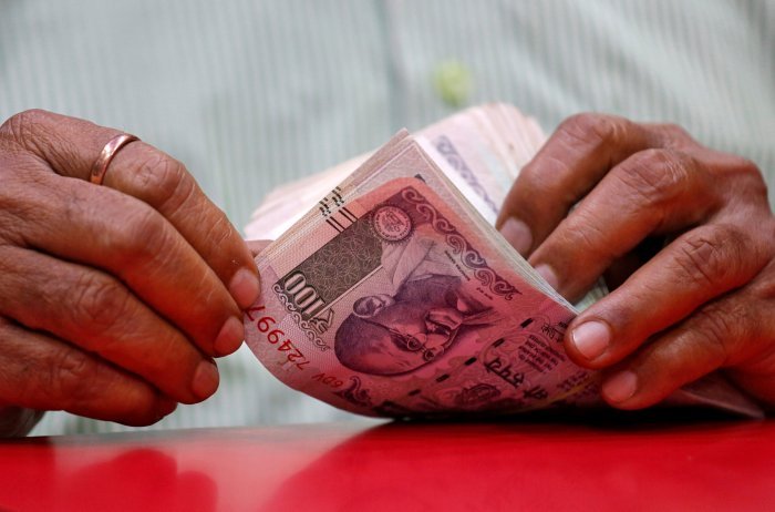 Rupee inches up 3 paise to 70.91 versus USD
