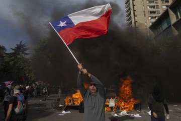 Protesters take to the streets in Santiago, other Chilean cities