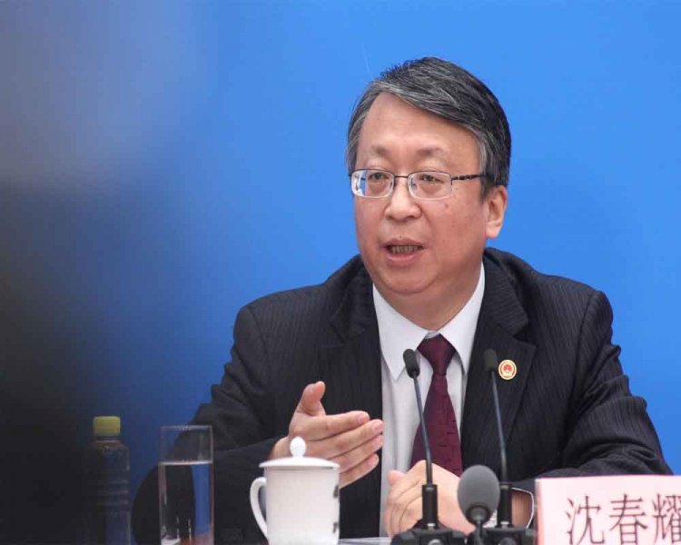 China says will 'improve' way Hong Kong chief executive selected