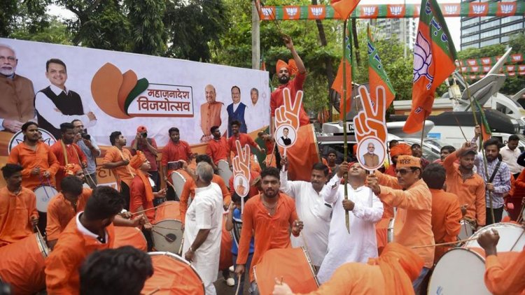 BJP workers celebrate as party forms govt in Maha