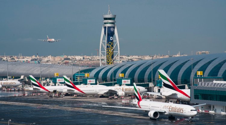 Travel hub UAE to halt flights as virus reaches Gaza