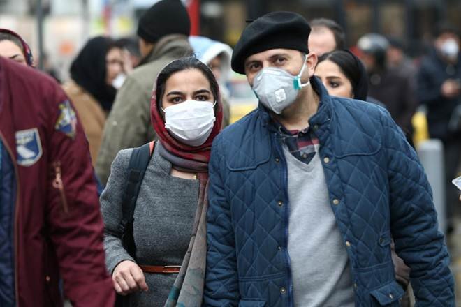 Iran says no longer at 'red' status, reports 93 new virus deaths