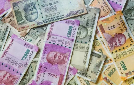 Rupee settles 7 paise higher at 76.18 against US dollar
