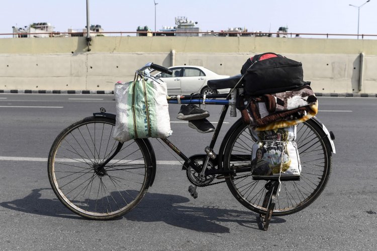 When 'home' is under a flyover and life's belongings fit on a cycle