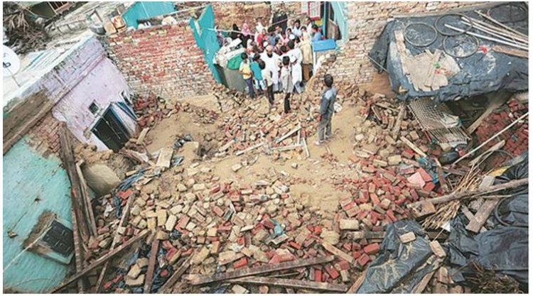 Two die as part of old house collapses amid rains