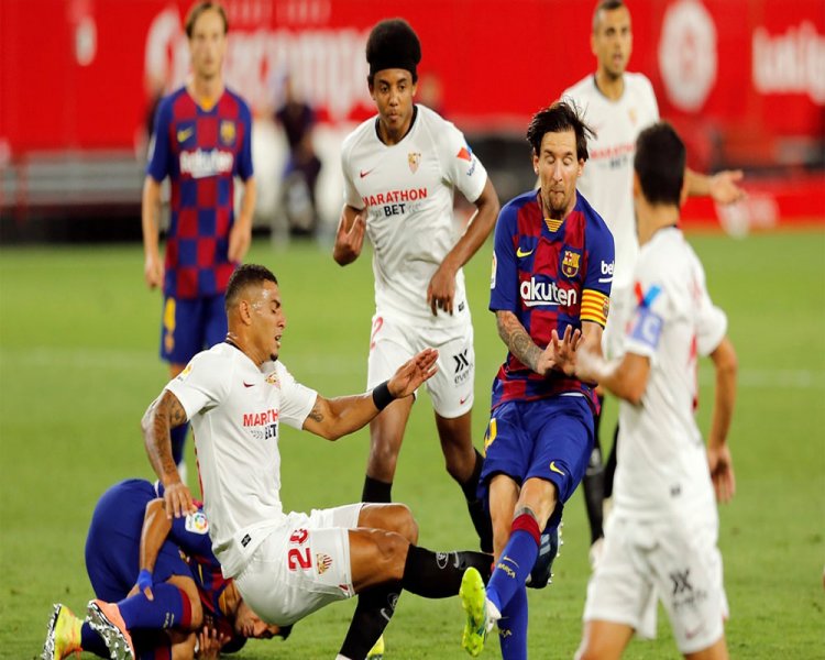 Barca held 0-0 at Sevilla, gives Madrid chance to pull level