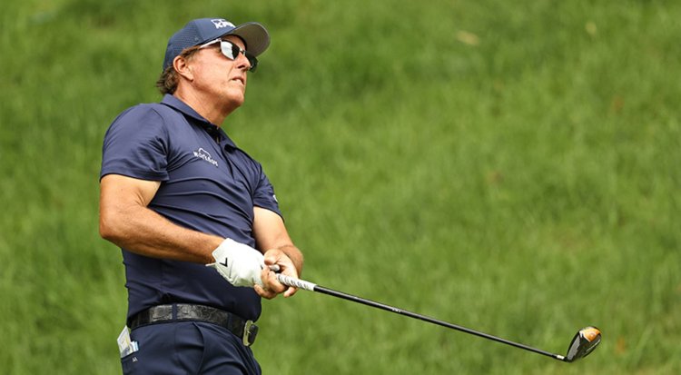 Mickelson leads Travelers in first event since turning 50