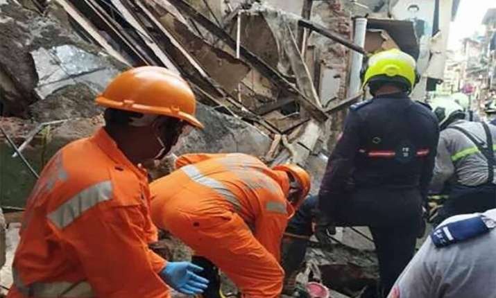 Two trapped in debris after house collapse