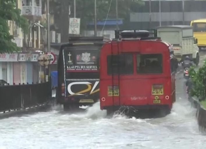Heavy rains batter Mumbai; local trains, road traffic hit hard