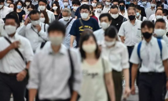Japan's economy shrinks at record rate, slammed by pandemic
