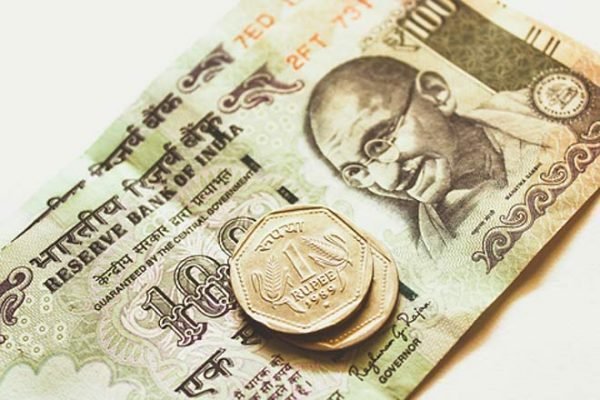 Rupee sees high volatility; rises marginally to 73.46/USD in early trade