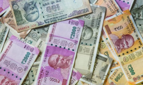 Rupee settles 12 paise higher at 73.52 against US dollar