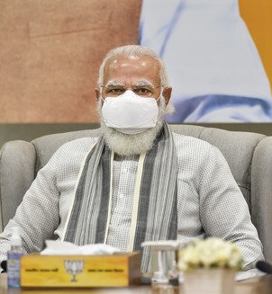 PM assures Andhra, T'gana CMs of all help after heavy rains cause loss of lives, damage