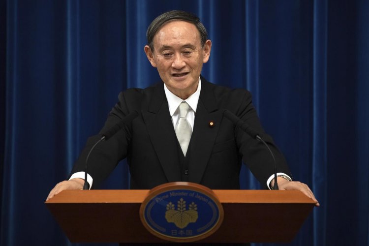 Japan's populist, pragmatic new PM Suga pushes Abe's vision