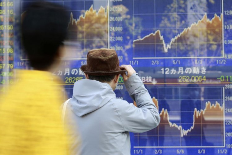Asian shares mostly higher as focus shifts to virus recovery