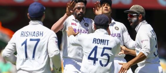 Rohit's dismissal puts India on backfoot after rookie attack restricts Australia to 369